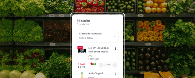 Overhead view of fresh vegetables neatly arranged in a grocery display.